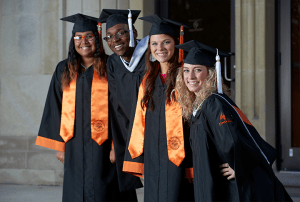 Herff Jones Helps Graduates Graduate With A Cap And Gown That Matches Their School
